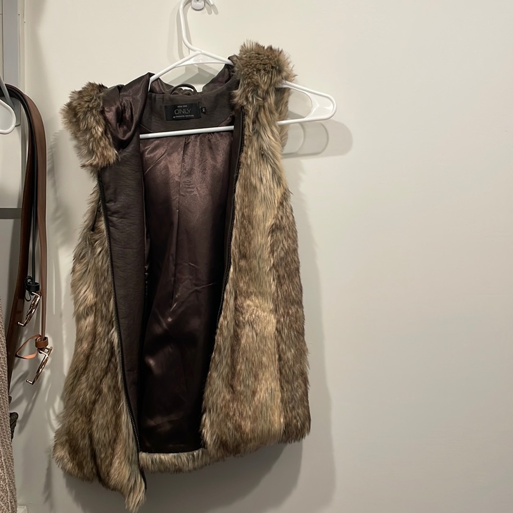 Fur vest with hood